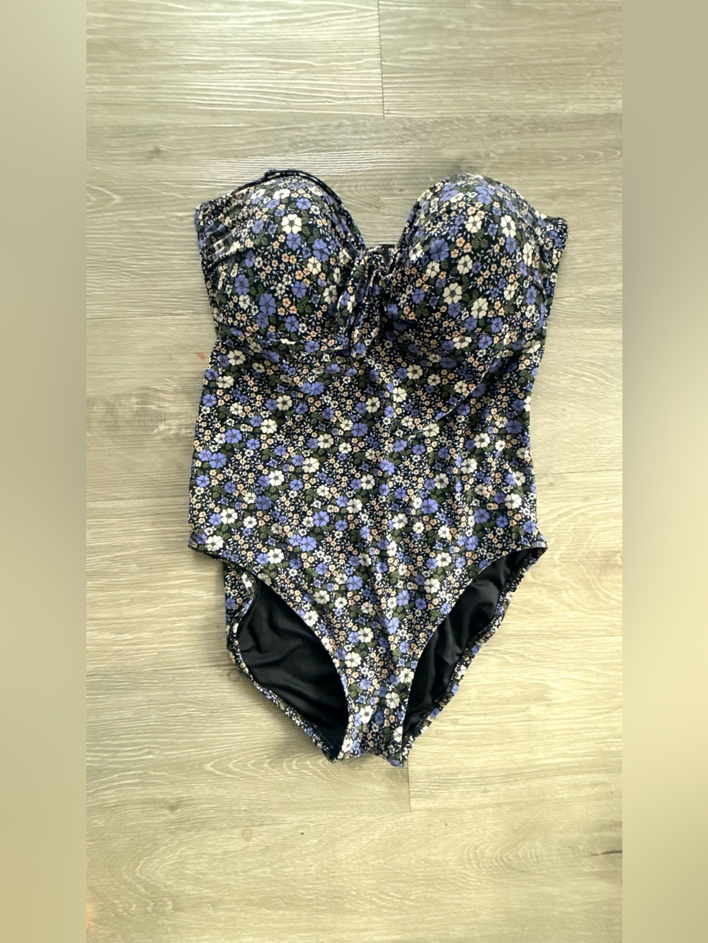 Woman Black Floral One-Piece Swimsuit with Purple Flowers